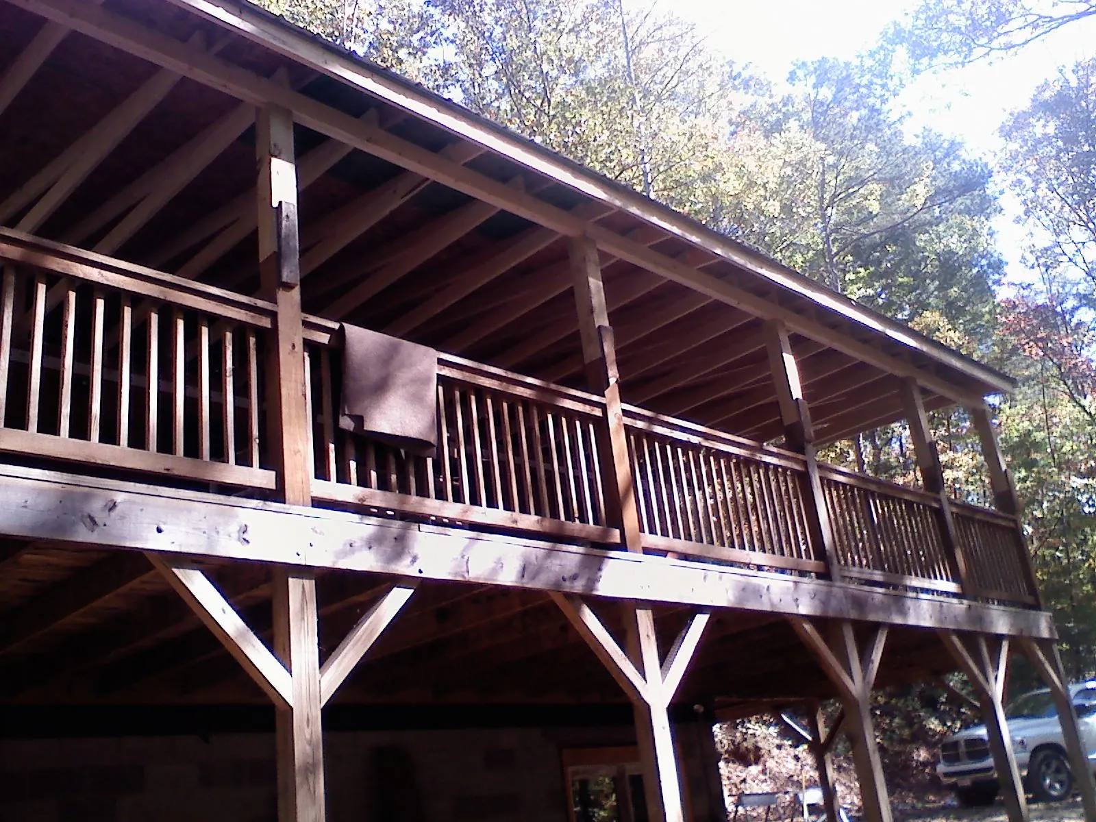 Timber framing under a new elevated porch and deck — Roof Leak Repair in Mc Clure by Roofing Brothers